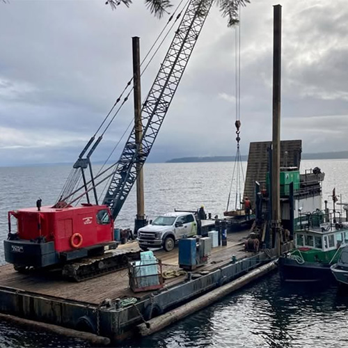 offgrid-3 marine construction project vancouver island barge crane remote build